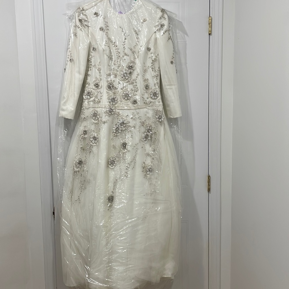 Stunning white gown with flowers and beads